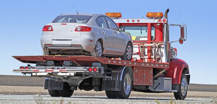 towing service - flatbed tow truck